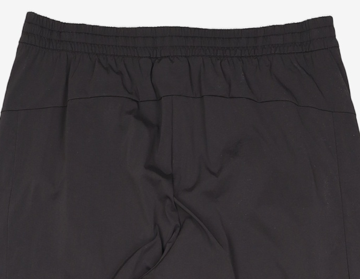 엄브로(UMBRO) PTR 우븐 워밍업 조거 팬츠 블랙 UR121SPT39 M