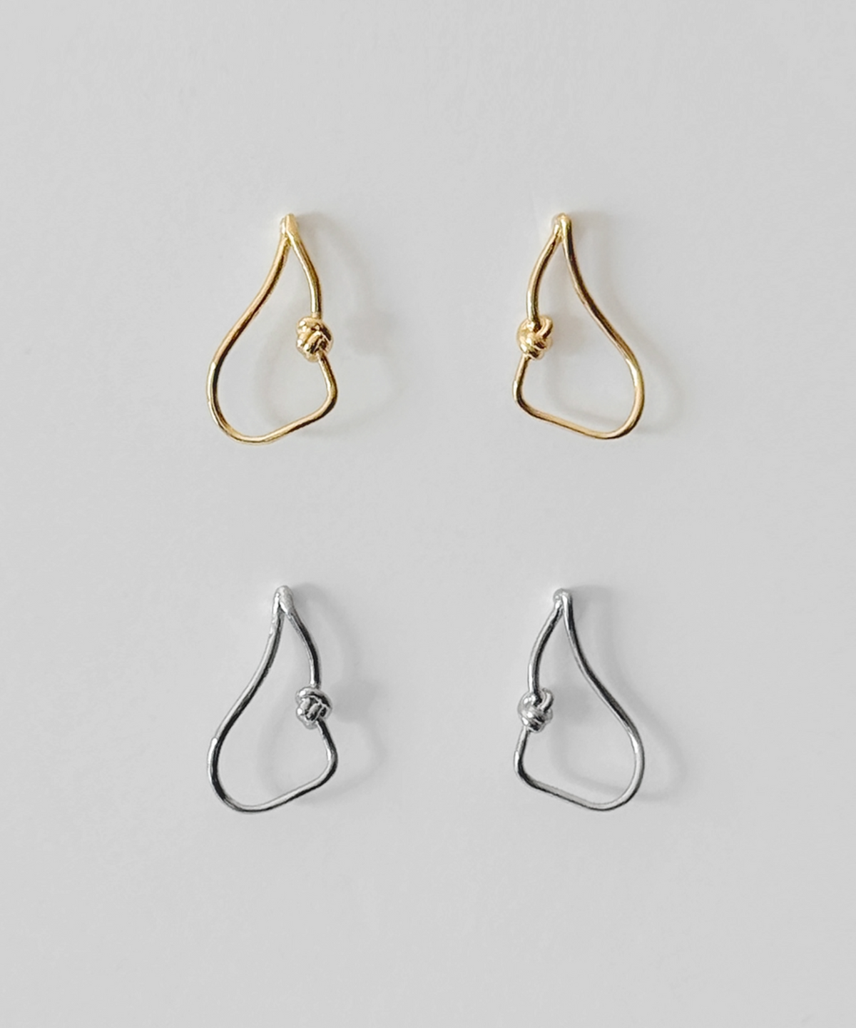 판타스틱 플래닛(FANTASTIC PLANET) flow knot earrings (2colors)