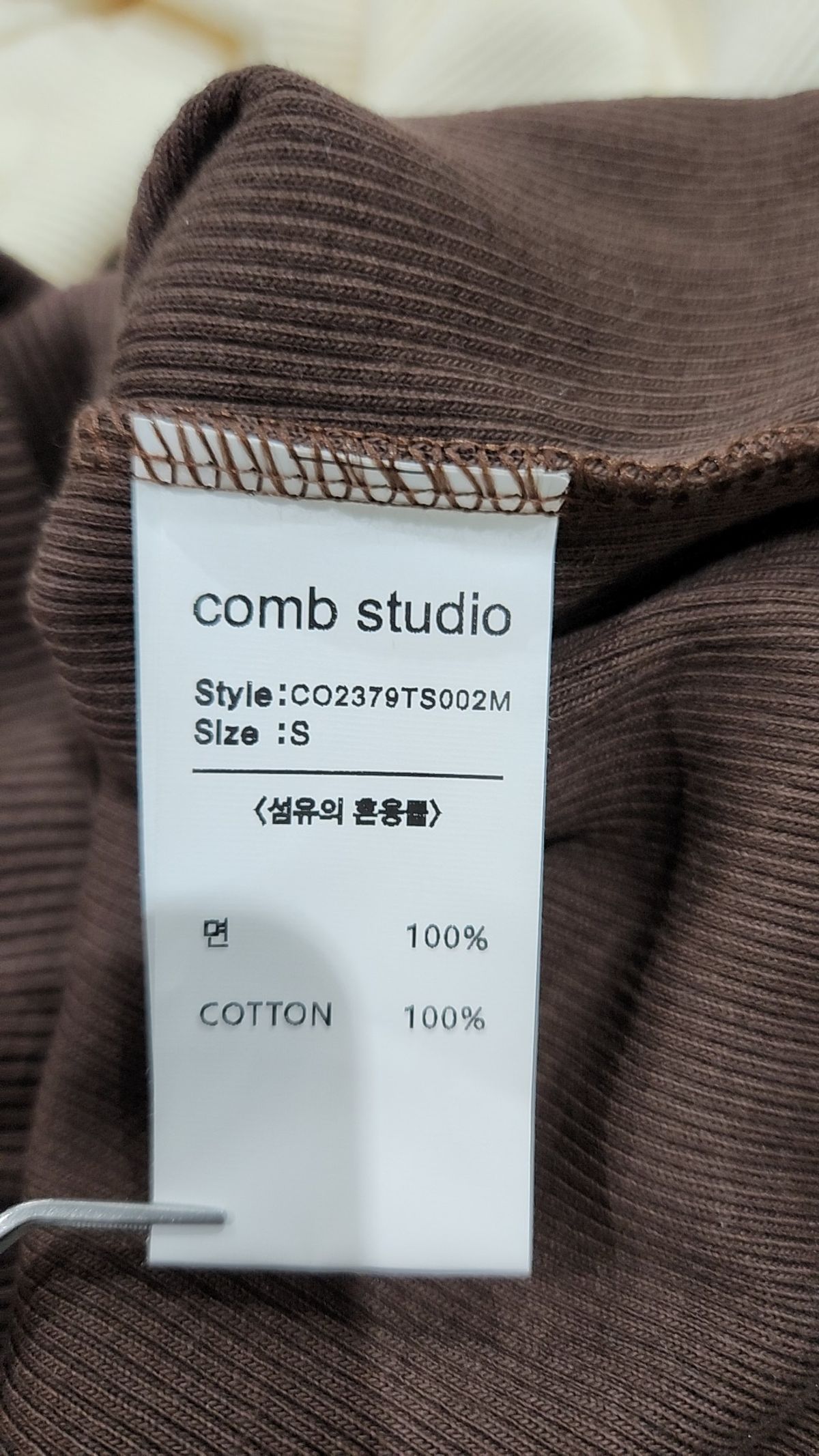 콤 스튜디오(COMBSTUDIO) CO OFF SHOULDER COLOR MIX JERSEY TOP_BLACK S