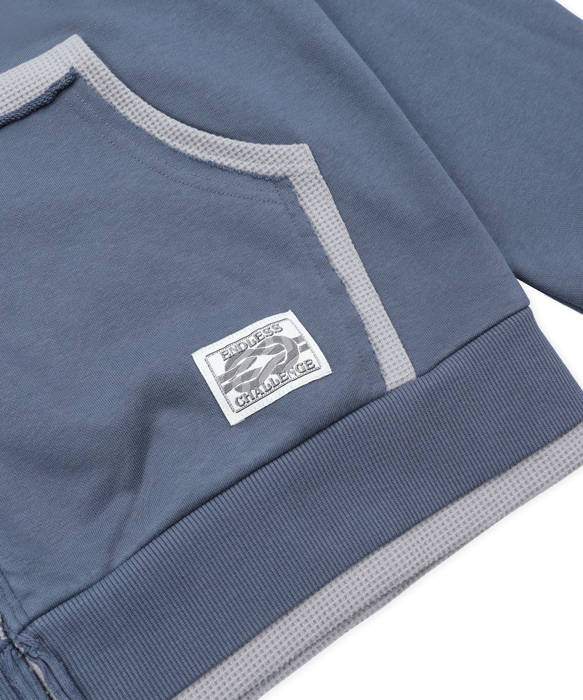 엑스톤즈(XTONZ) XTT169 핑거홀 와플 레이어드 크롭 후드 집업 (NAVY)