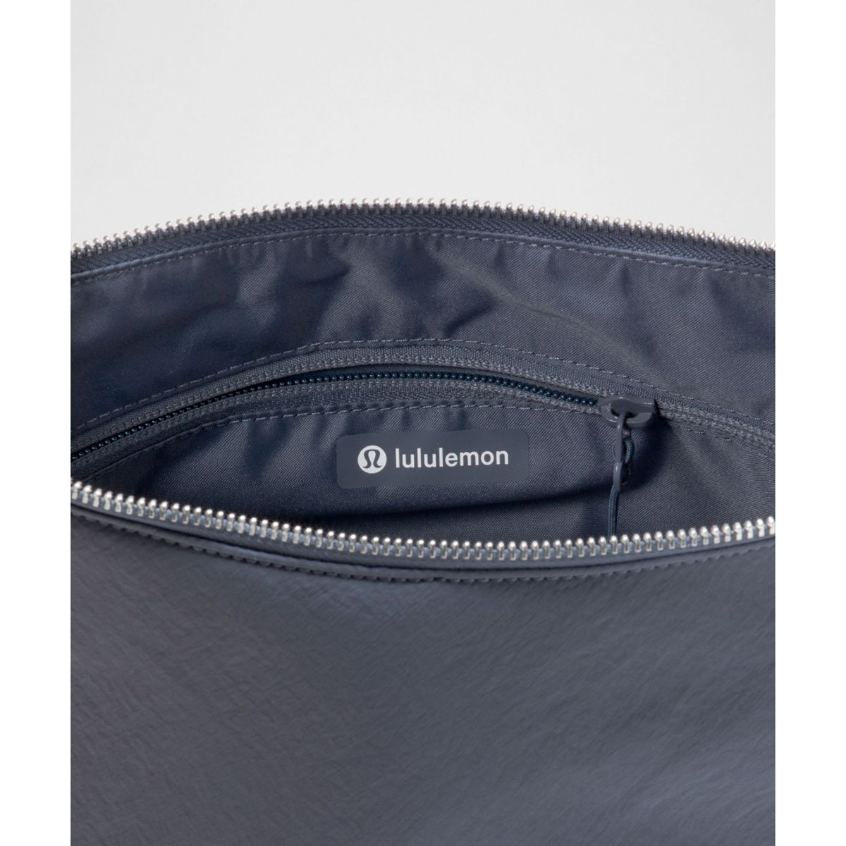 룰루레몬(LULULEMON) 컨버터블 루시드 크로스바디 백 6.5L  DDND TRNV SLVR