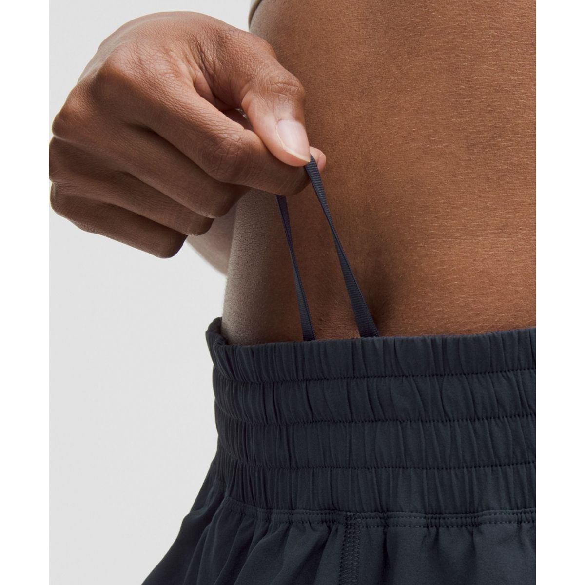 룰루레몬(LULULEMON) 셰이크 잇 아웃 하이라이즈 러닝 쇼츠 2.5inch  TRNV