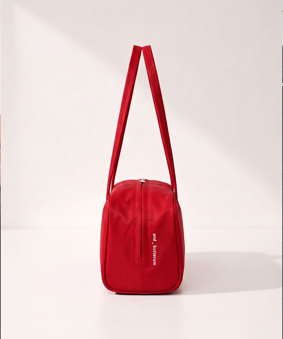 앤버터럼(ANDBUTTERUM) 멜로우(MELLOW) 새틴 나일론 데일리 볼링백