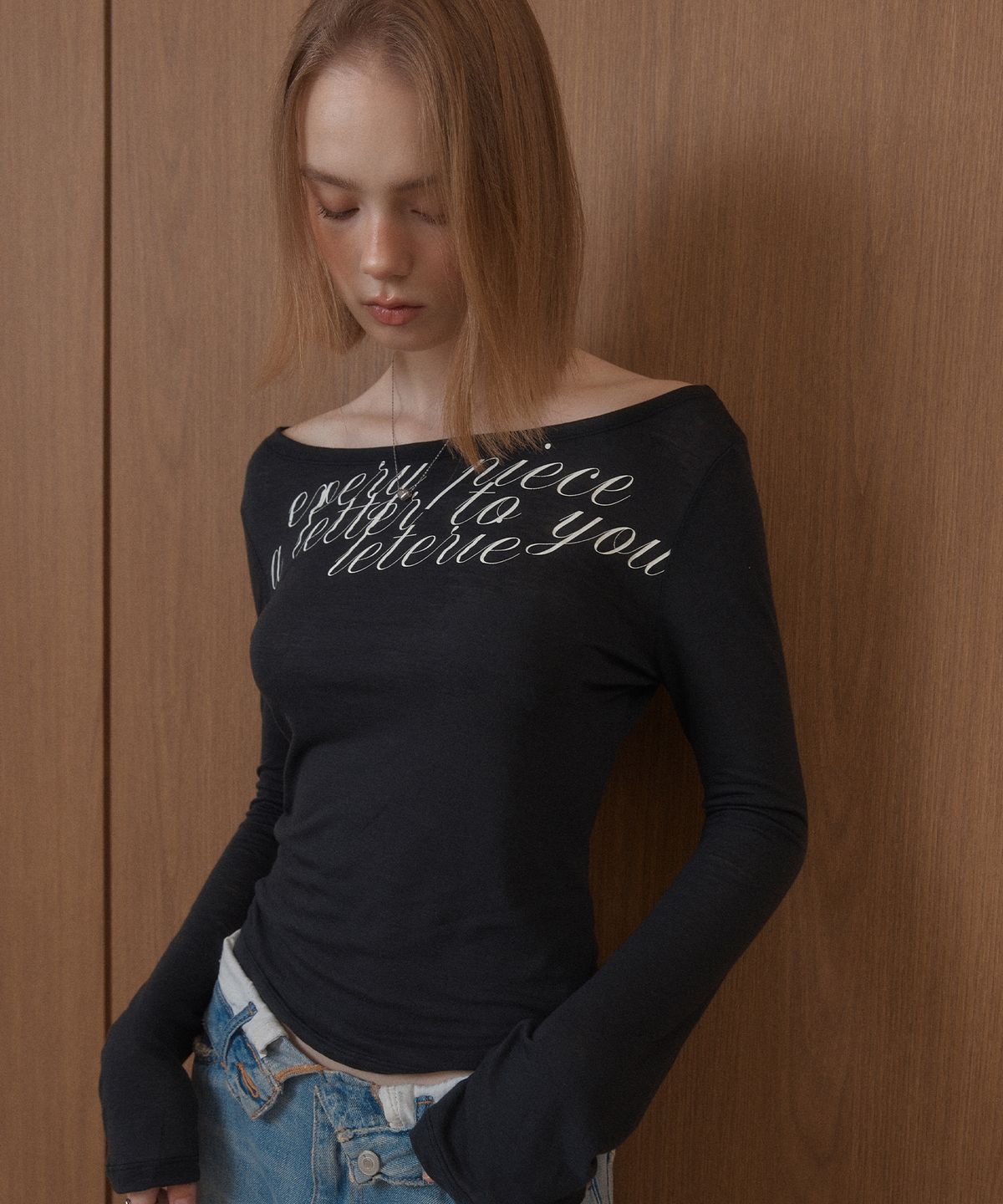 레터리(LETERIE) LETTERING OFF-SHOULDER TIE LONG SLEEVE_SHEER BLACK