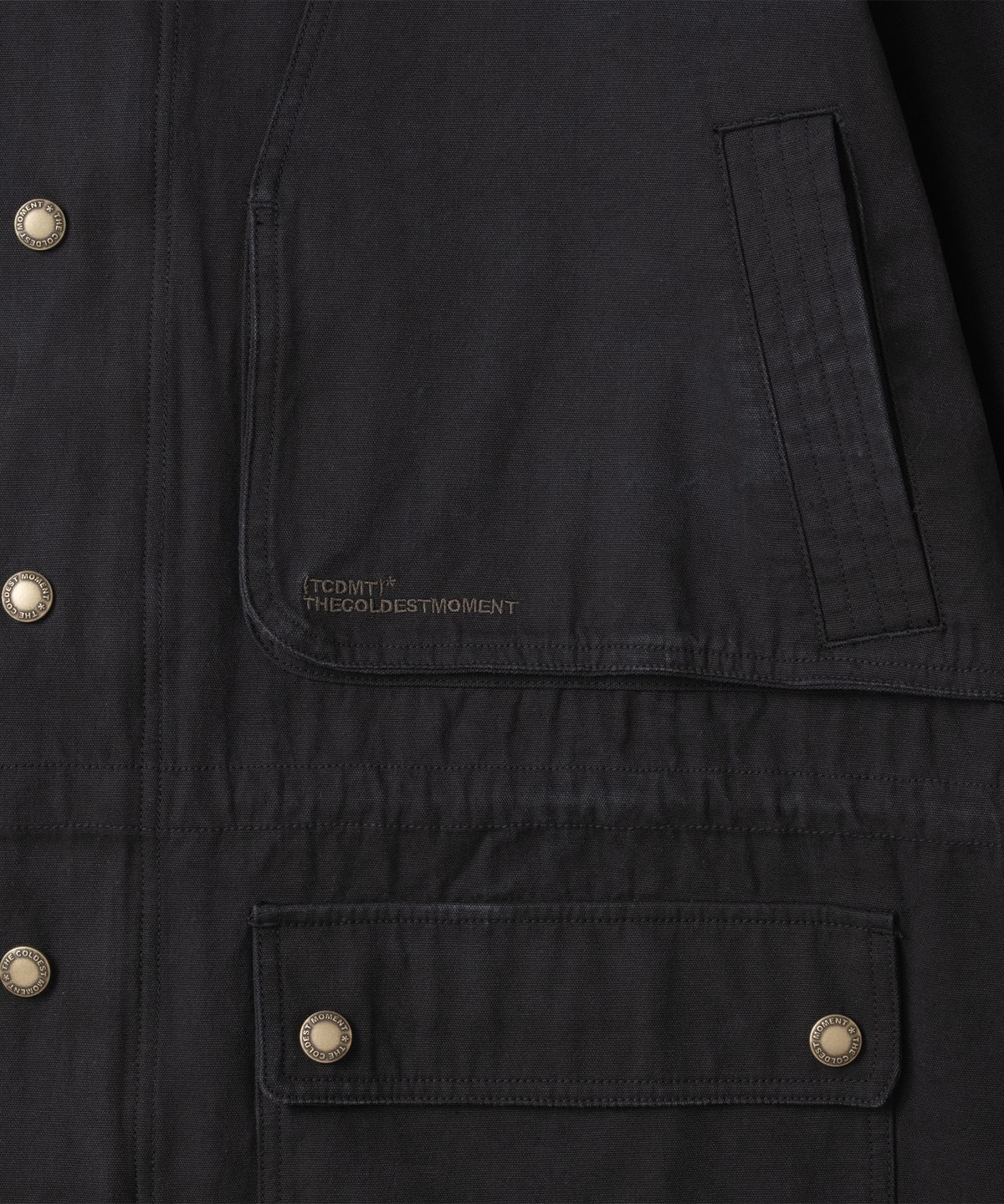 더콜디스트모먼트(THECOLDESTMOMENT) TCM logo snap field jacket (black)