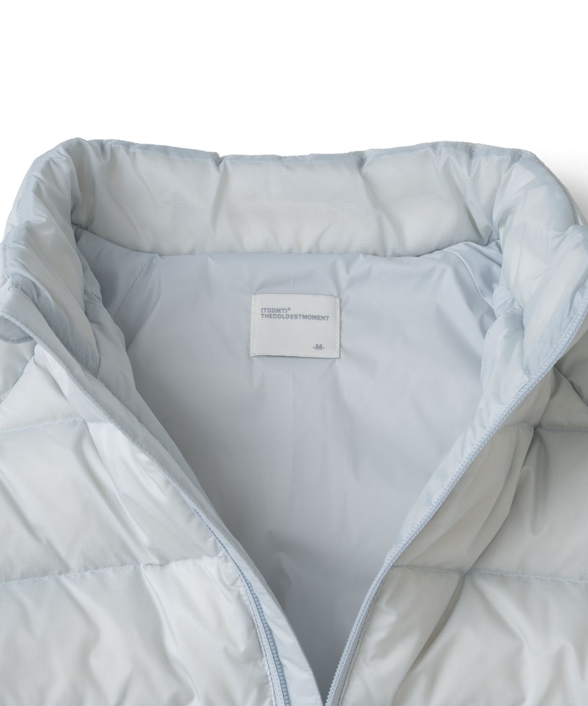 더콜디스트모먼트(THECOLDESTMOMENT) TCM slice fingerhole down jacket (light grey)