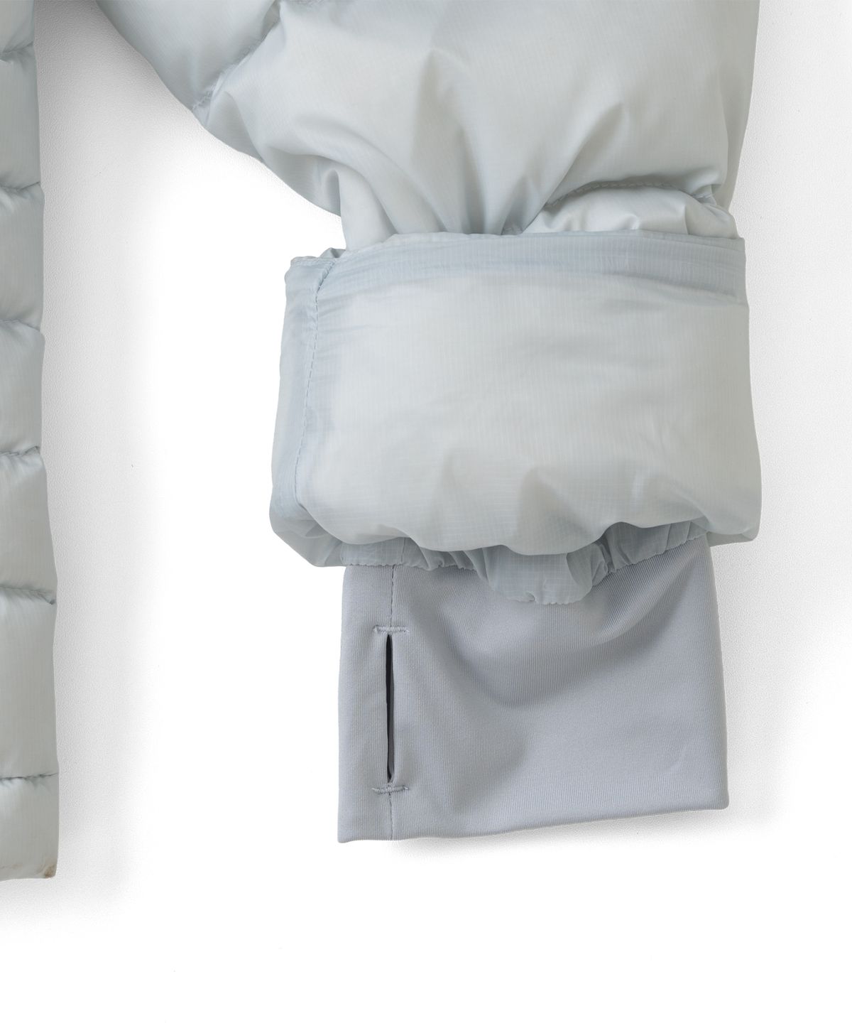 더콜디스트모먼트(THECOLDESTMOMENT) TCM slice fingerhole down jacket (light grey)