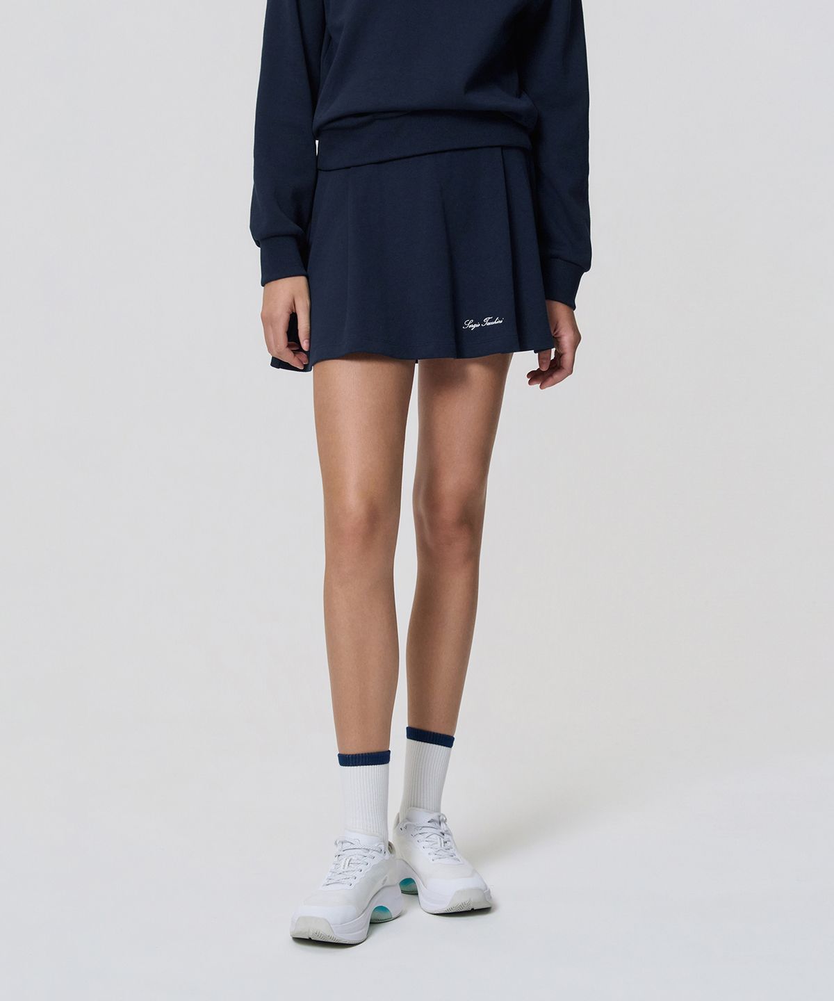 세르지오 타키니(SERGIO TACCHINI) W 타키니 60th 플레어 스커트 (Navy)