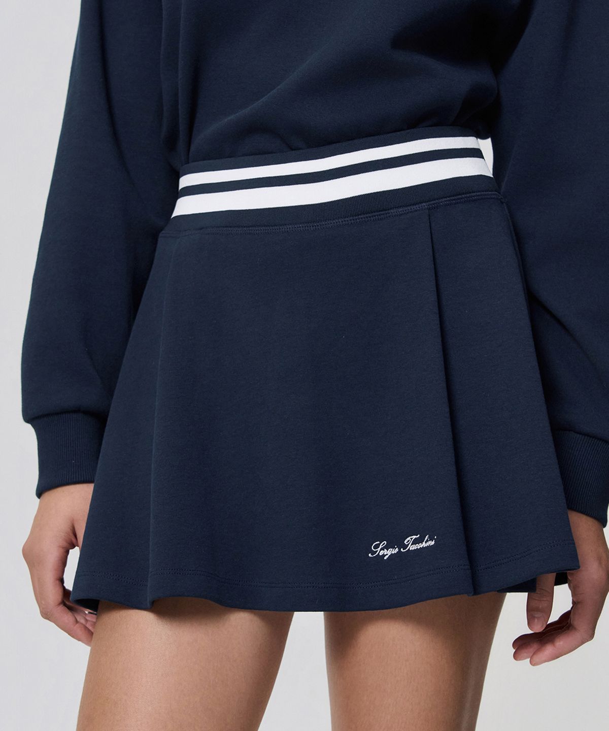 세르지오 타키니(SERGIO TACCHINI) W 타키니 60th 플레어 스커트 (Navy)