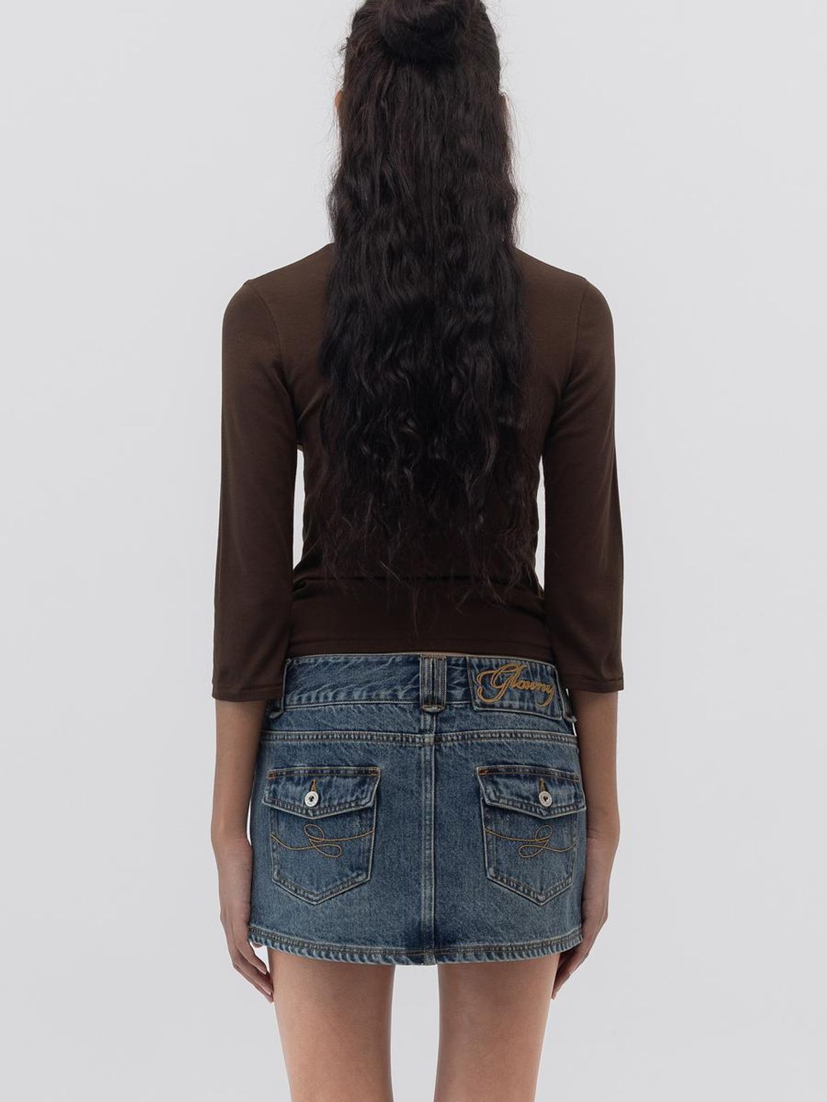 글로니(GLOWNY) CURVY DENIM MINI SKIRT (DEEP BLUE)