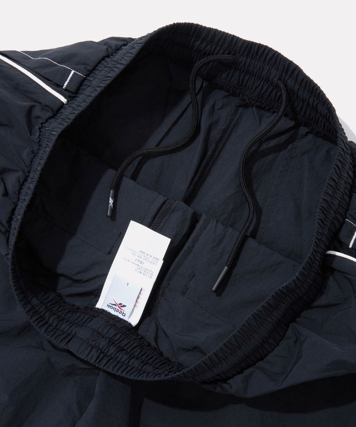 리복(REEBOK) 프리미어 우븐 트랙 팬츠 - 블랙