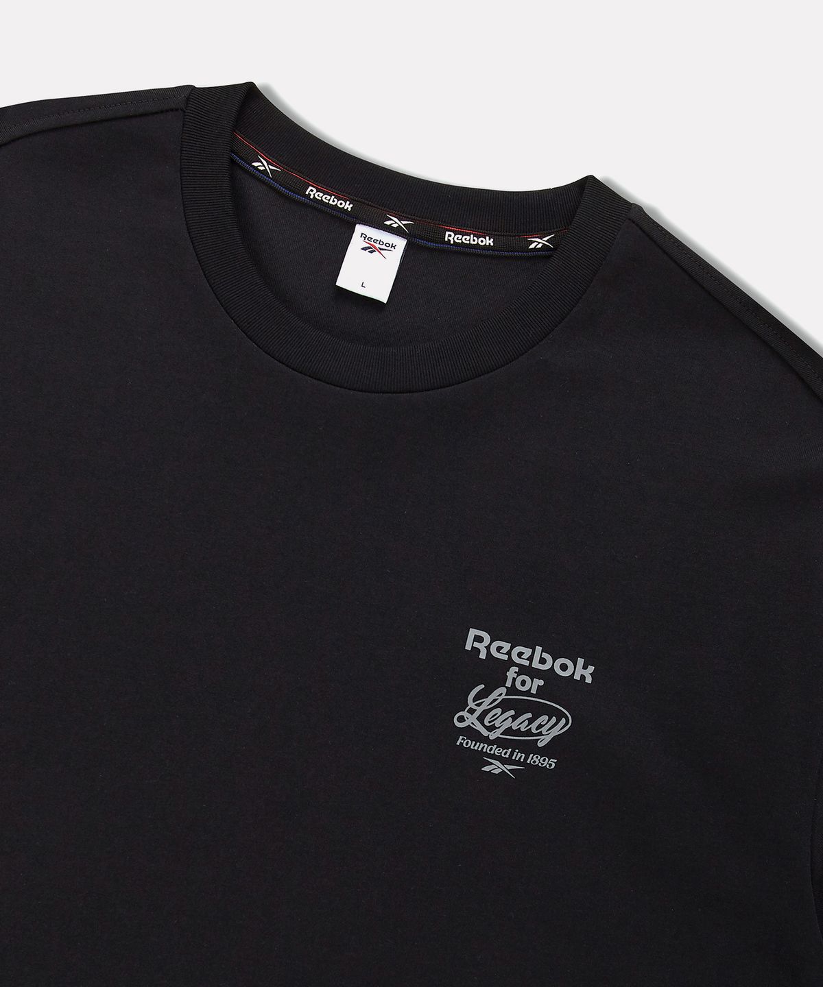 리복(REEBOK) 레거시 로고 레이어드 긴팔티 - 블랙