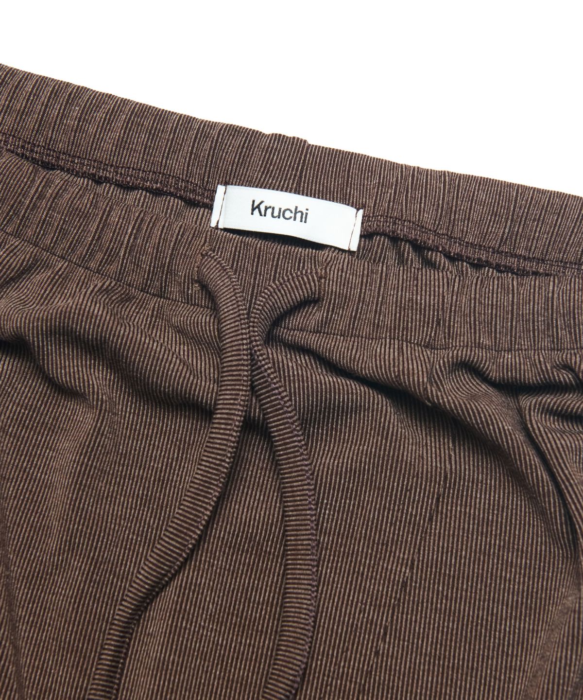 크루치(KRUCHI) RAW EDGE LONG SKIRT (BROWN) WOMENS
