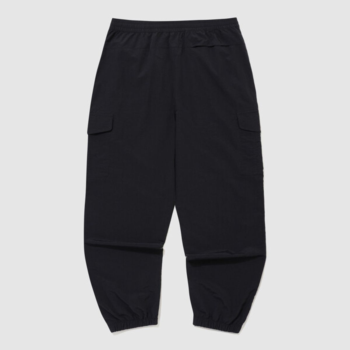 엄브로(UMBRO) 클래식 우븐 조거 팬츠 블랙 UR323CPT94