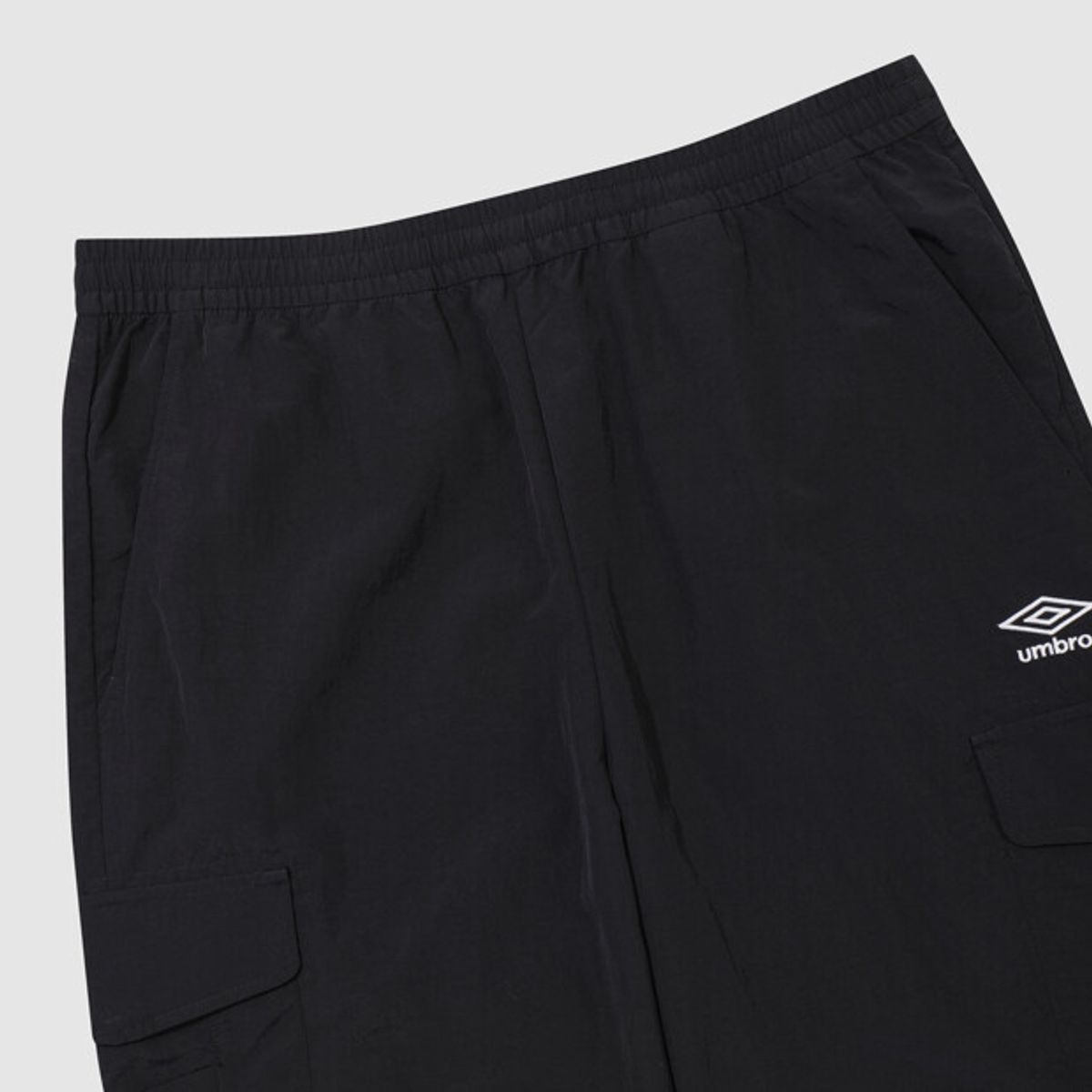 엄브로(UMBRO) 클래식 우븐 조거 팬츠 블랙 UR323CPT94