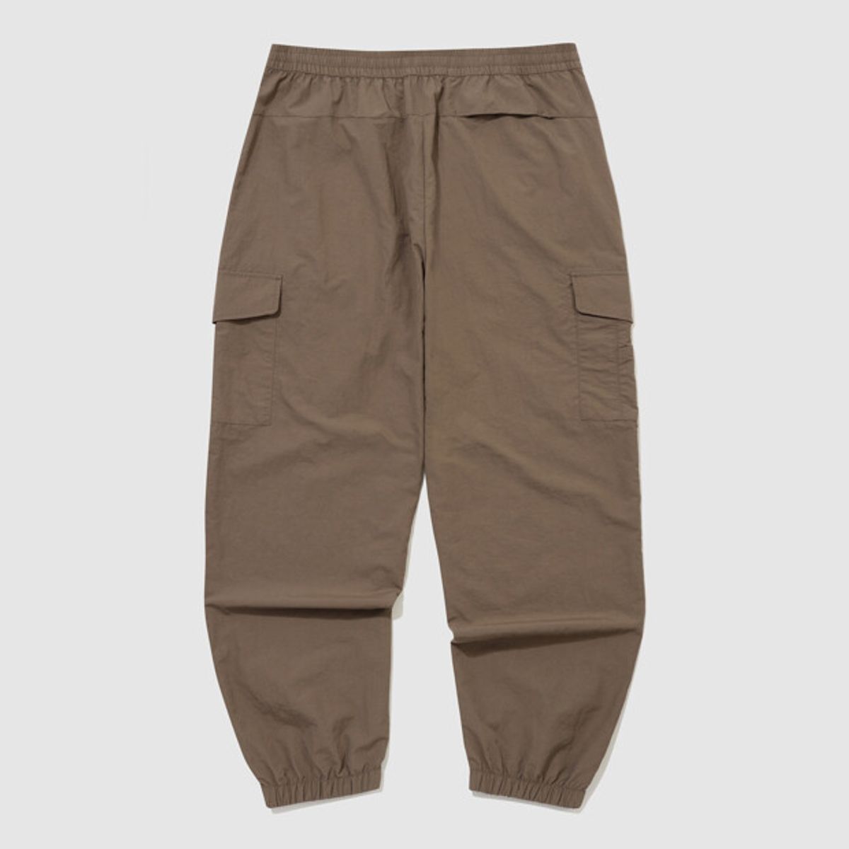 엄브로(UMBRO) 클래식 우븐 조거 팬츠 브라운 UR323CPT94