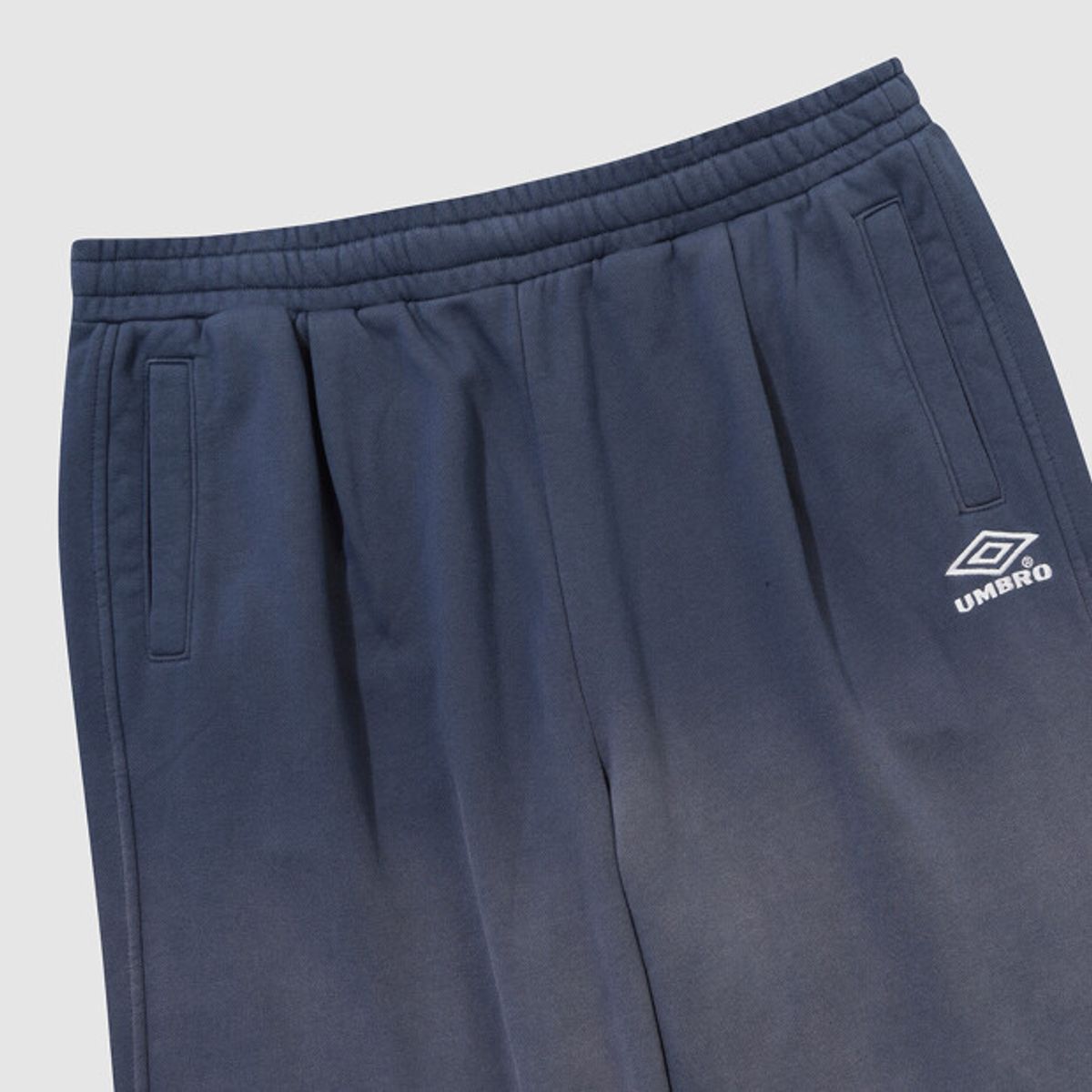 엄브로(UMBRO) 크리스피 타슬란 조거 & 와이드 2WAY 스웨트 팬츠 네이비 UR323CFP91