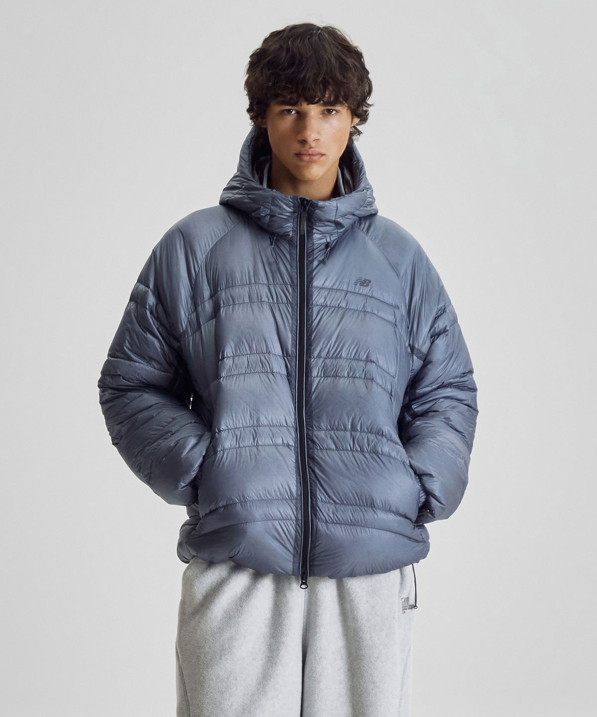 뉴발란스(NEW BALANCE) NBNPG41913 / UNI 플라잉77 슈퍼라이트 후드형 경량 구스다운 (D/BLUE)