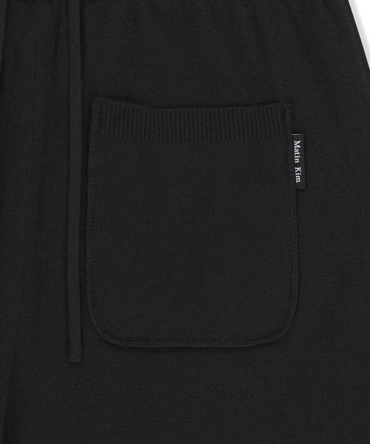 마뗑킴(MATIN KIM) LEG WARMER KNIT JOGGER PANTS IN BLACK