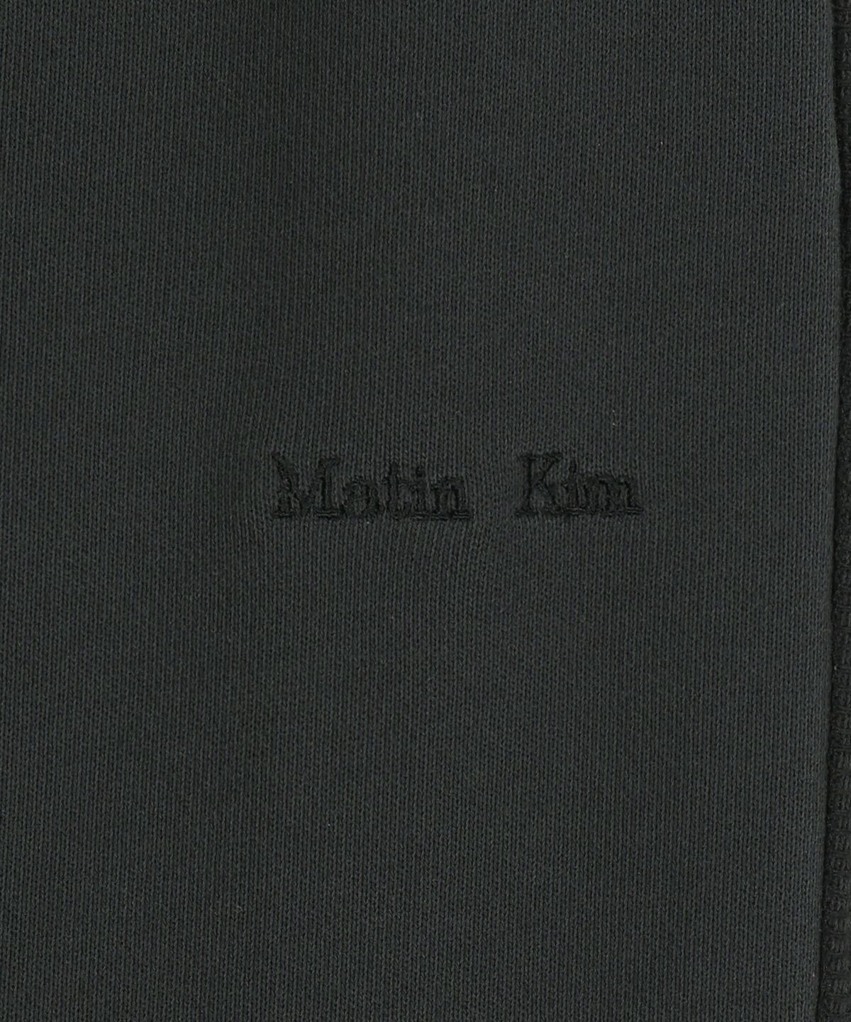 마뗑킴(MATIN KIM) COLORBLOCK CUT SEAM SWEATPANTS IN BLACK