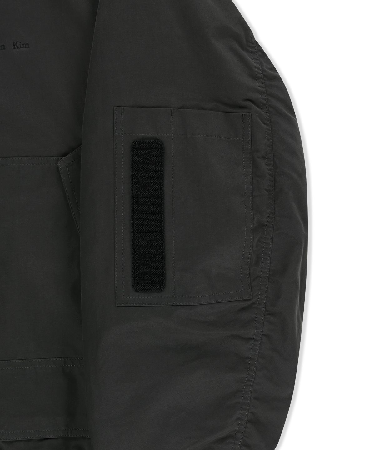 마뗑킴(MATIN KIM) BUCKLE HIGH NECK UTILITY JUMPER IN CHARCOAL