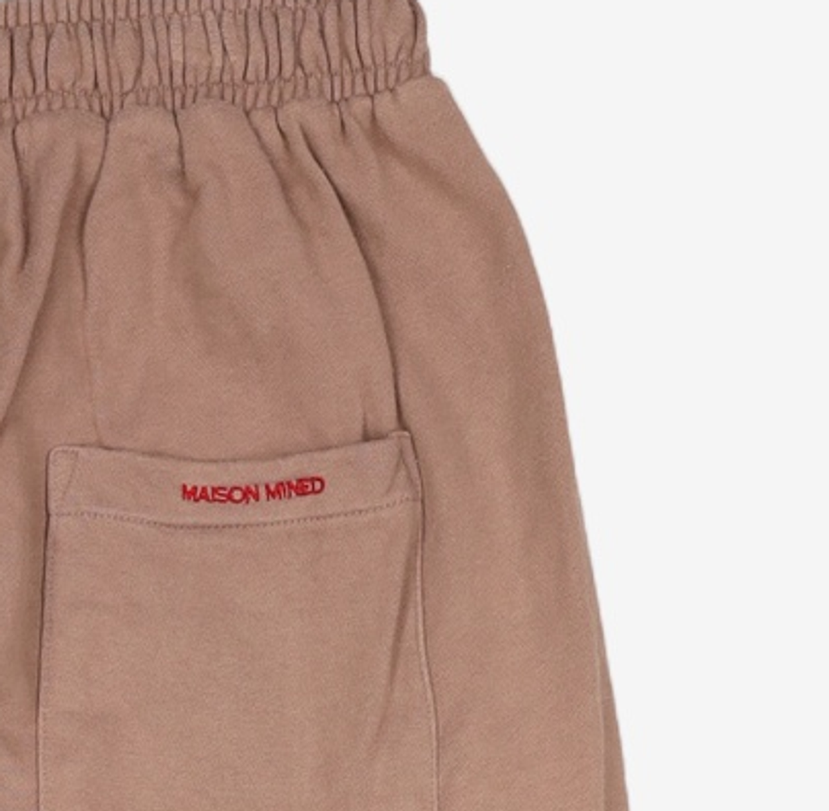 메종미네드(MAISON MINED) (THE LION KING)SMALL LOGO JOGGER PANTS DUSTY BEIGE 48