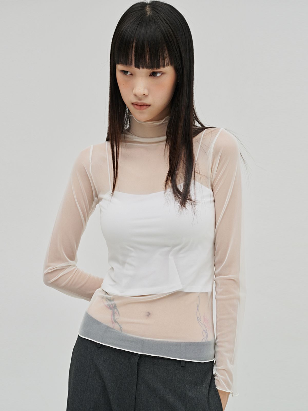 누브(NOUVE) 시어 하이넥 롱슬리브 티셔츠 - 크림 / Sheer High Neck Long Sleeve T-Shirt - Cream