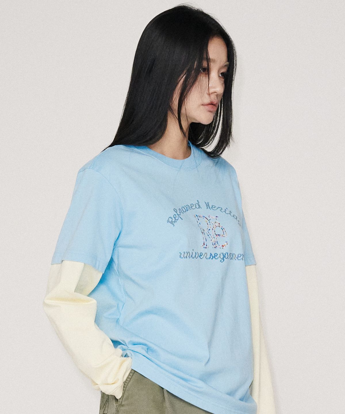 유니버스 가먼트(UNIVERSE GARMENT) 레이어드 그래픽 긴팔 티셔츠_LIGHT BLUE