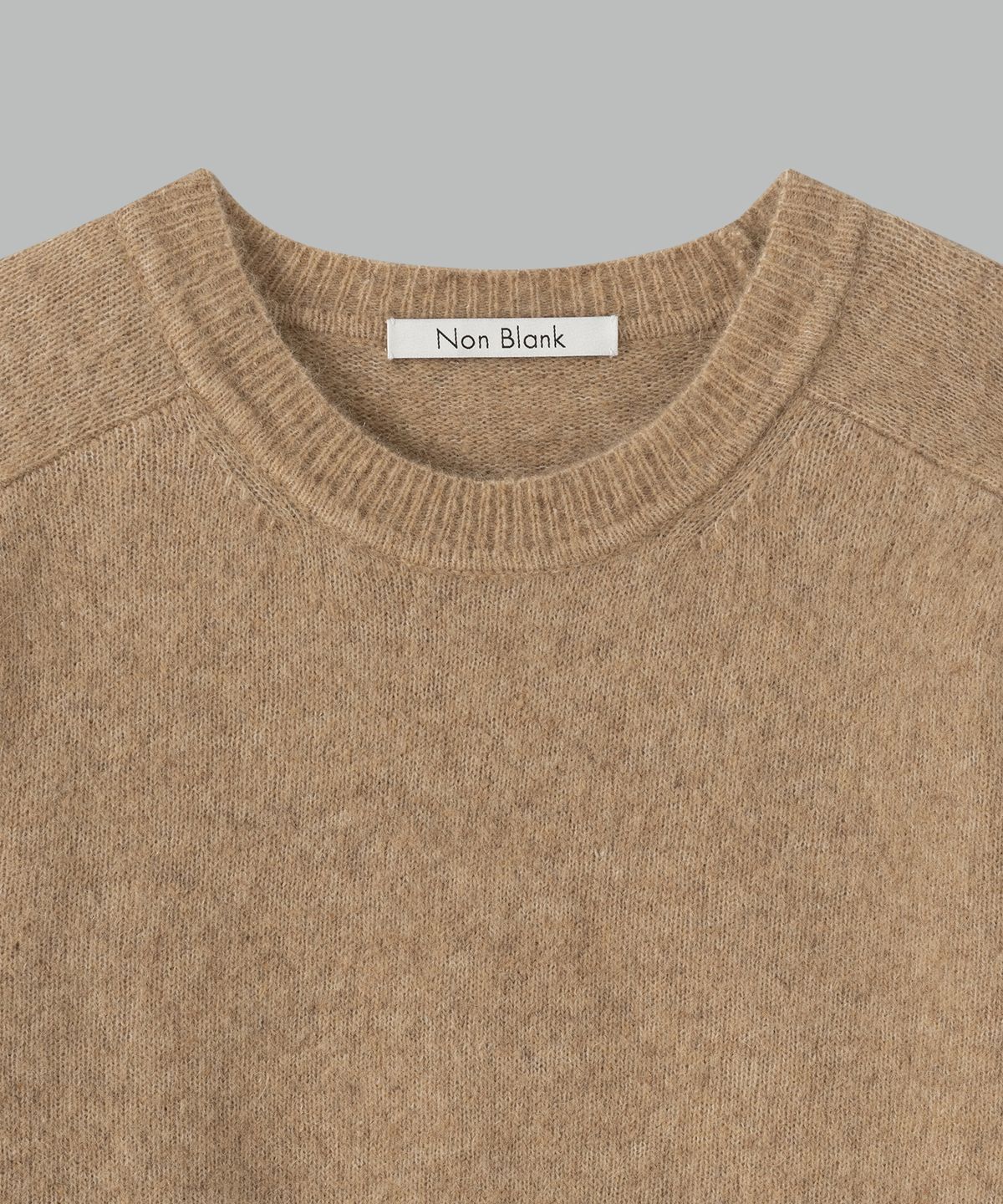 넌블랭크(NONBLANK) 모헤어 울 블렌드 크롭 라운드 니트_BEIGE