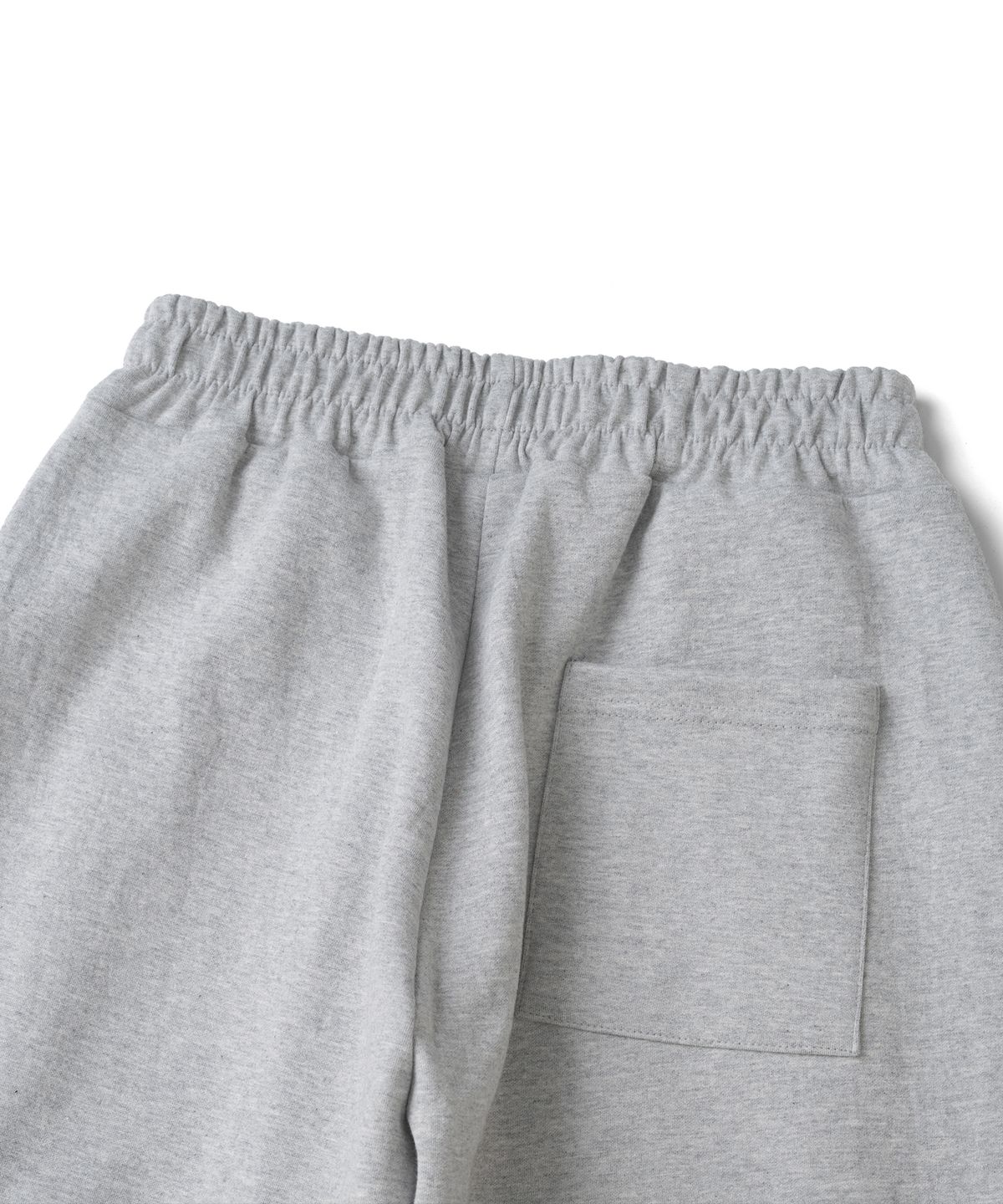 니티드(KNITTED) 커브드 라인 트레이닝 팬츠 MELANGE GREY