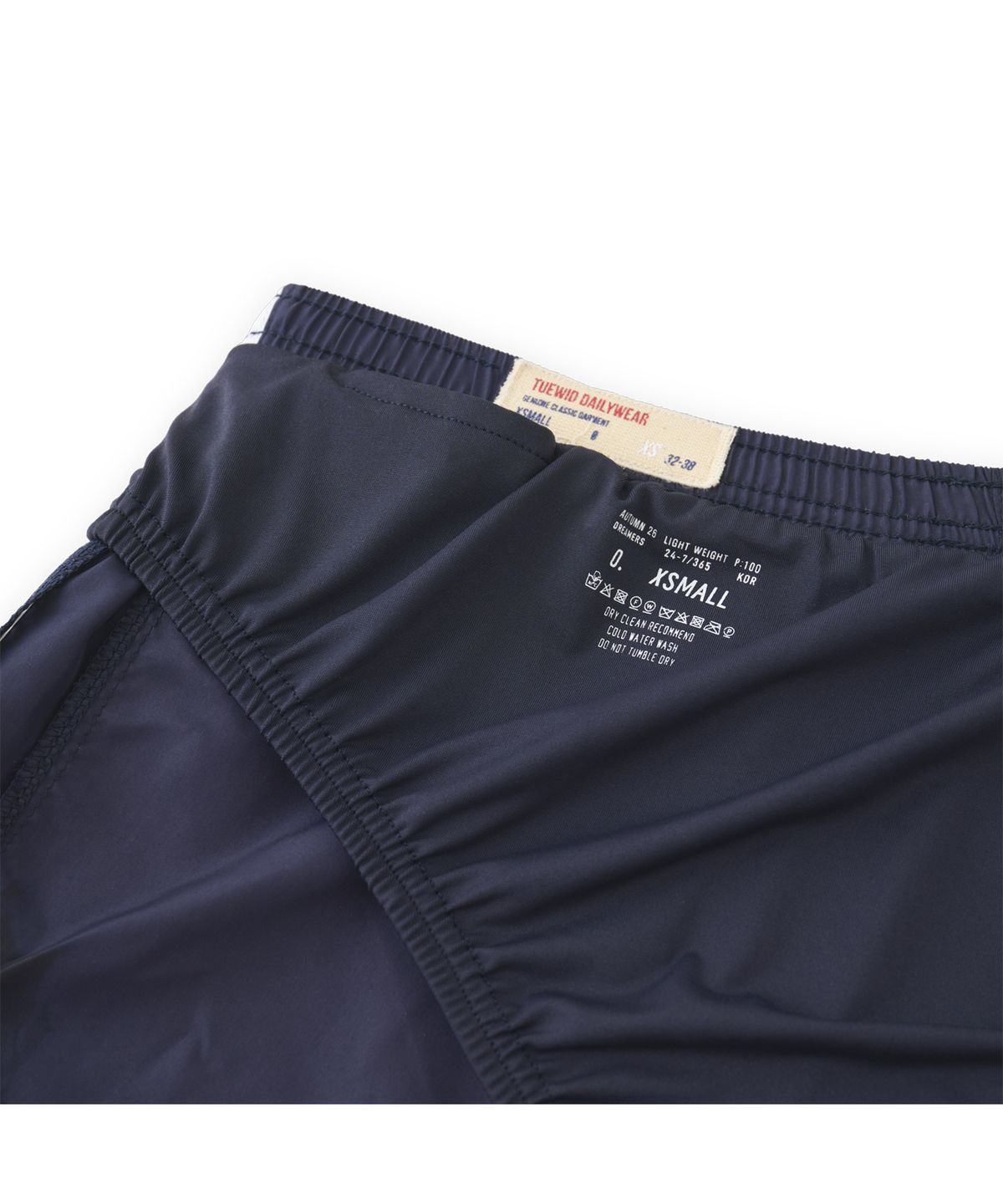 투위드(TUEWID) Line track shorts in dark blue
