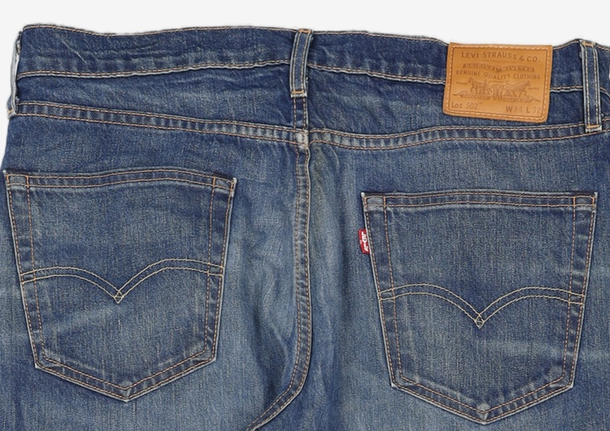 리바이스(LEVI'S) 남성 502 레귤러 테이퍼 핏 워프 스트레치 진_29507-0299 86