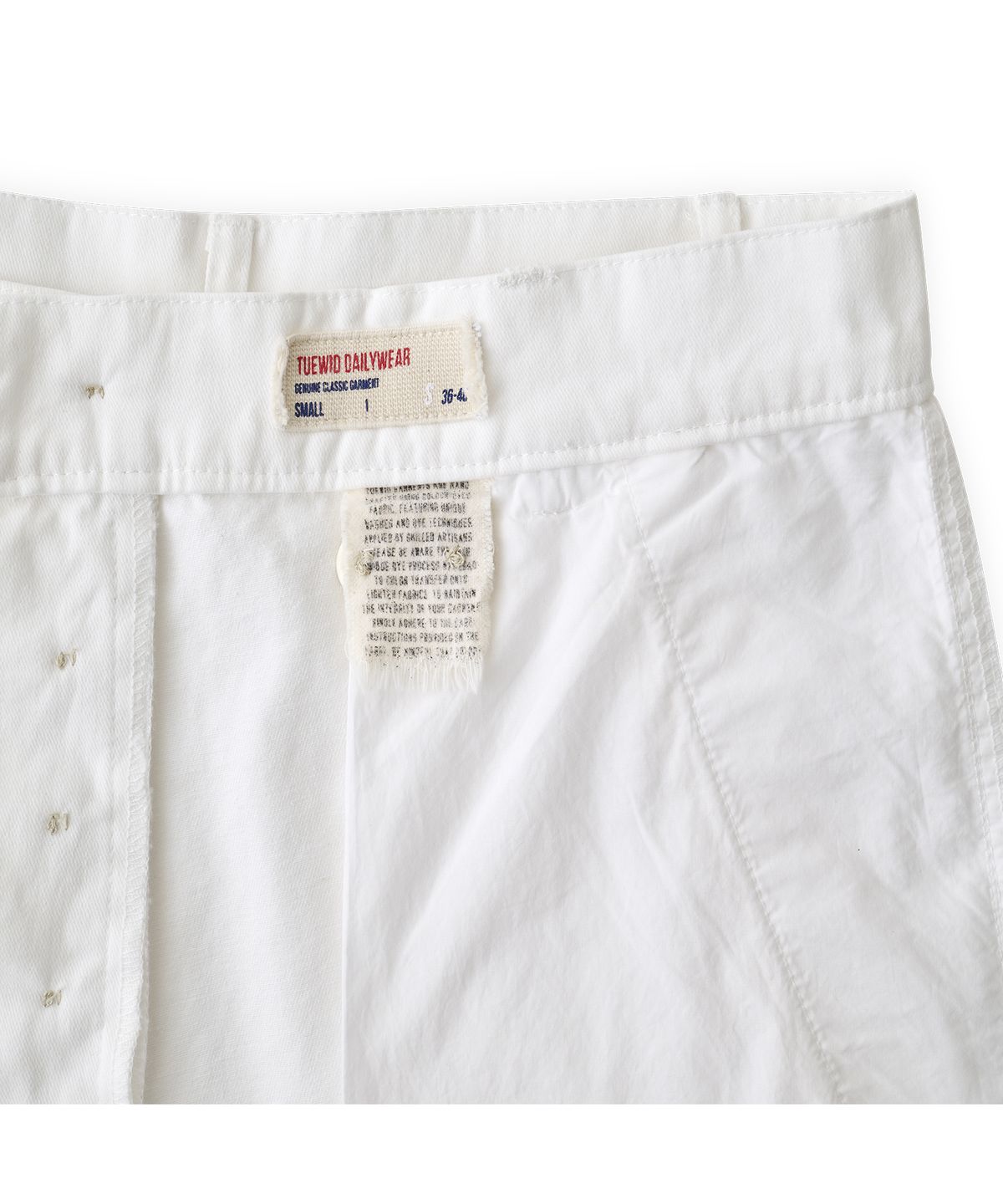 투위드(TUEWID) 003 washed cotton crop pants in coconut