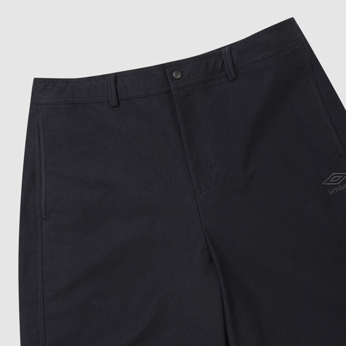 엄브로(UMBRO) 트윌 이중지 커브드 핏 팬츠 블랙 UR313CPT99