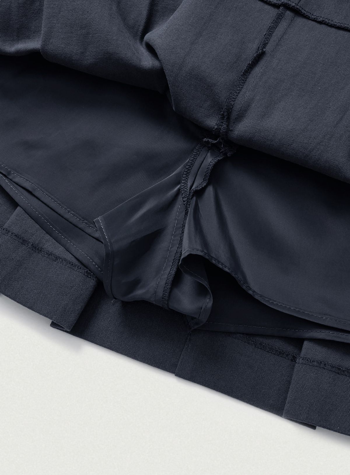 더바넷(THEBARNNET) Wael Pleats Mini Skirt_Navy