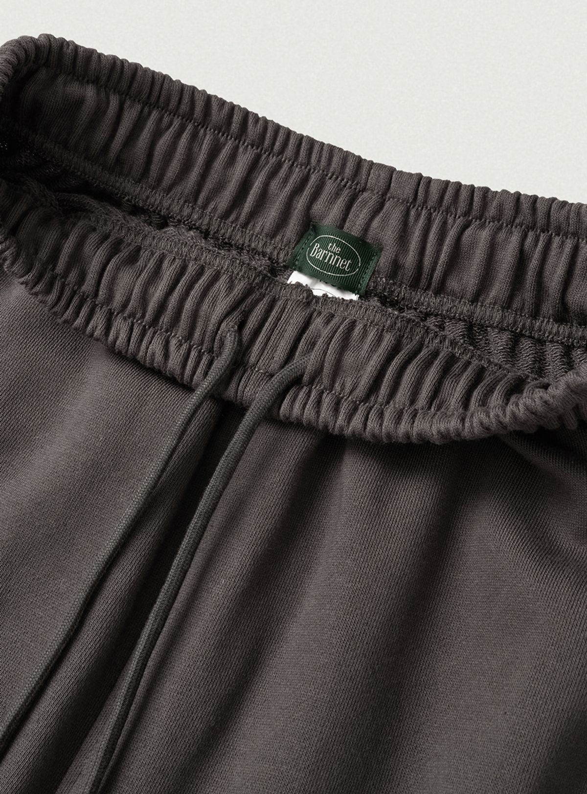 더바넷(THEBARNNET) Campie Sweat Drawstring Jogger Pants_Charcoal