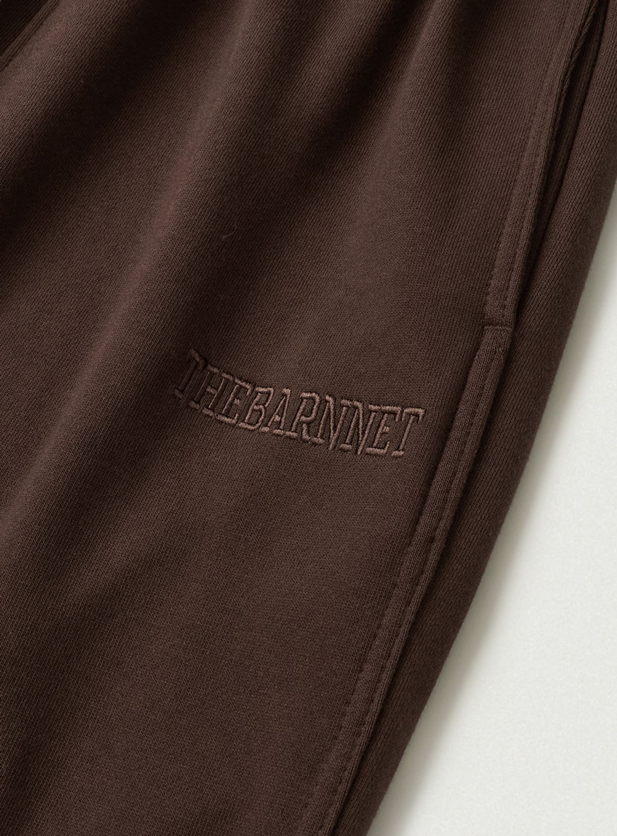 더바넷(THEBARNNET) Campie Sweat Drawstring Jogger Pants_Brown