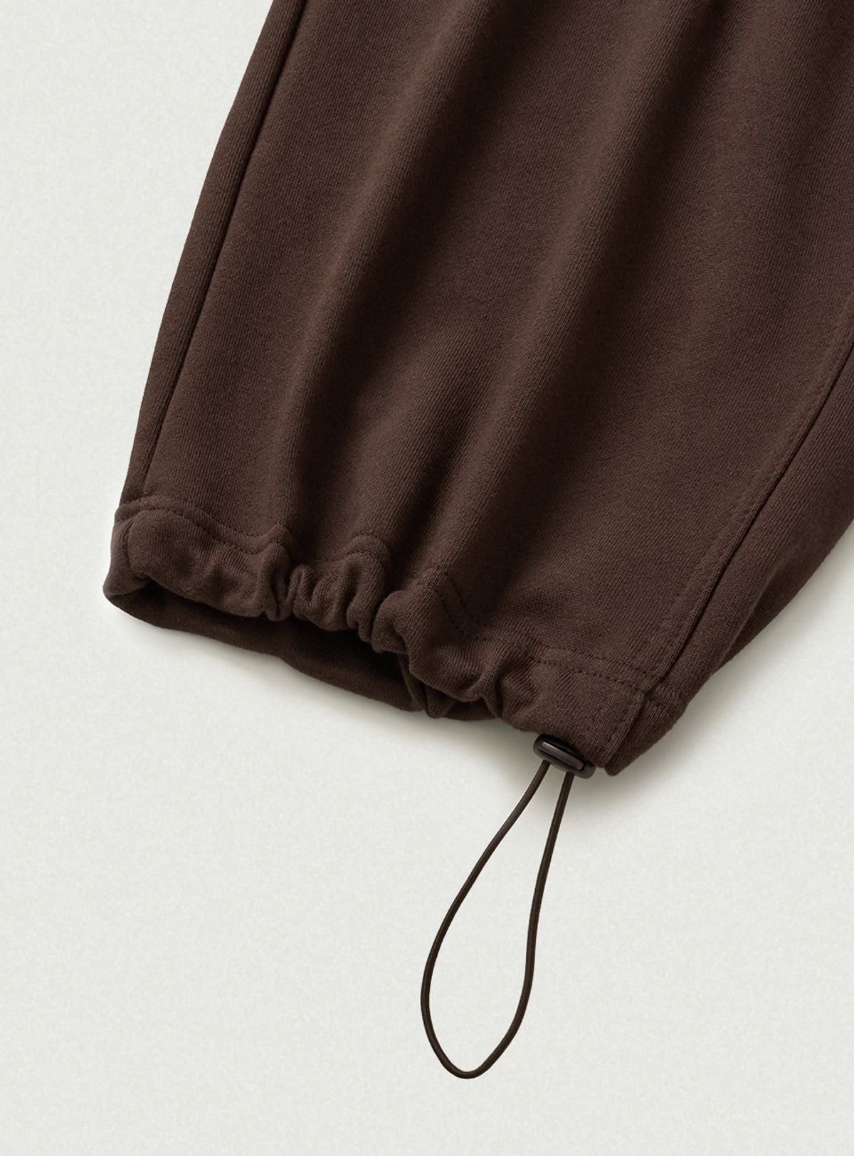 더바넷(THEBARNNET) Campie Sweat Drawstring Jogger Pants_Brown