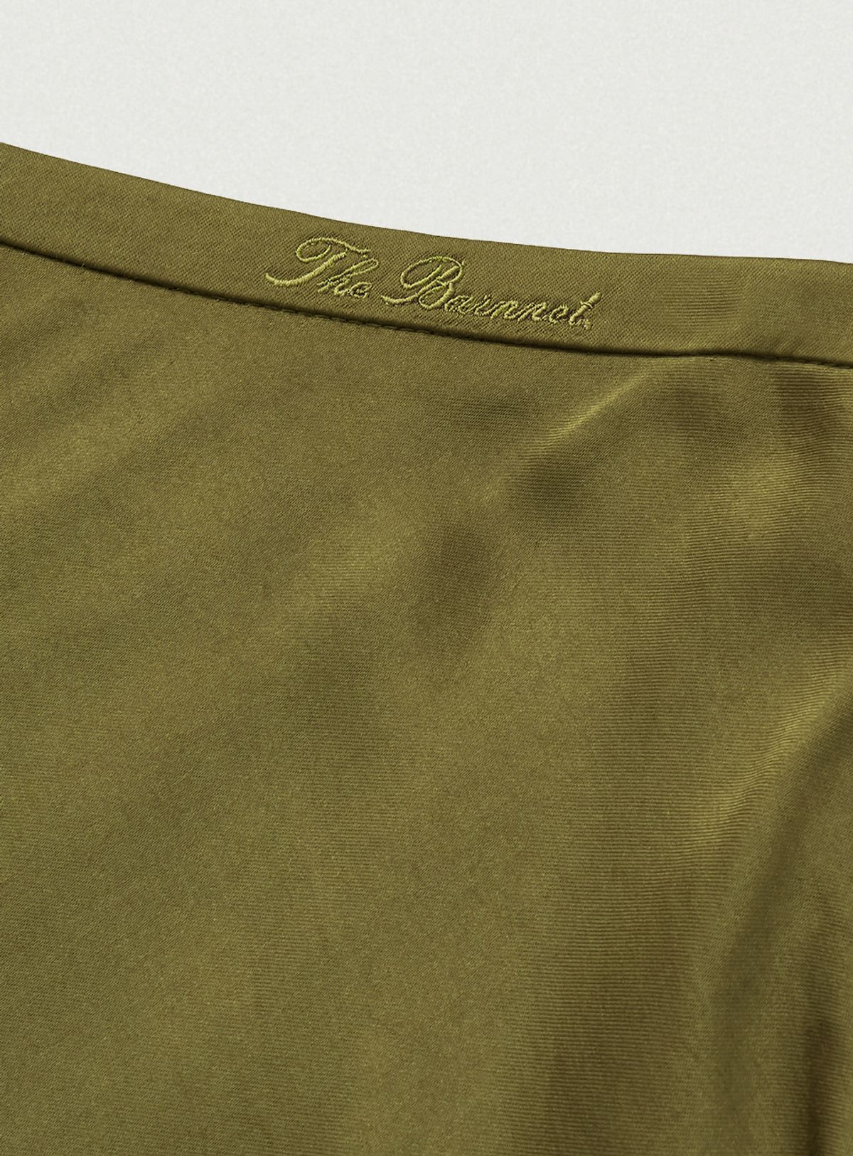 더바넷(THEBARNNET) Glow Satin Midi Skirt_Olive