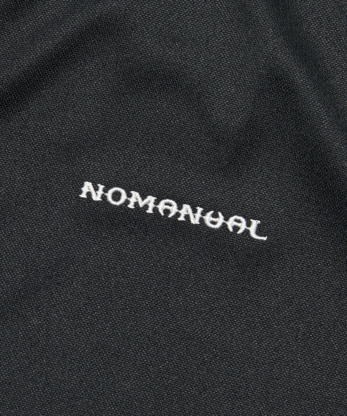 노매뉴얼(NOMANUAL) EMBROIDERED TRIBAL TRACK TOP - BLACK