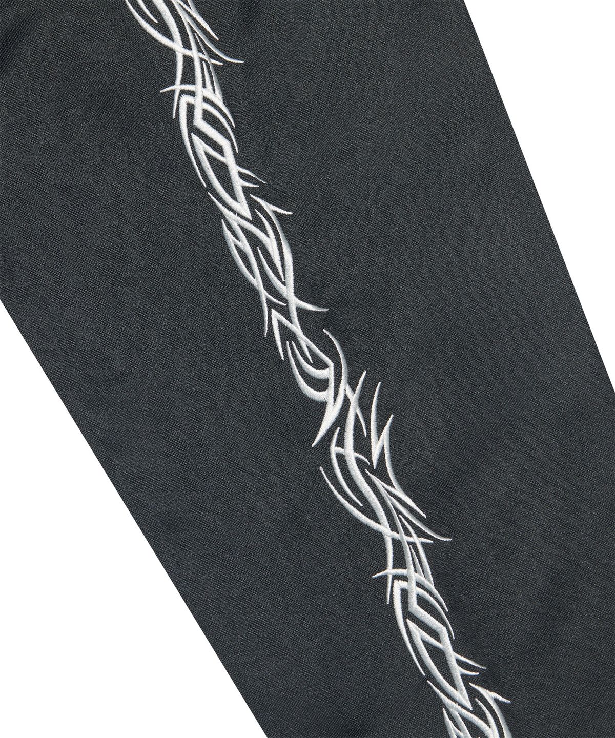 노매뉴얼(NOMANUAL) EMBROIDERED TRIBAL TRACK TOP - BLACK