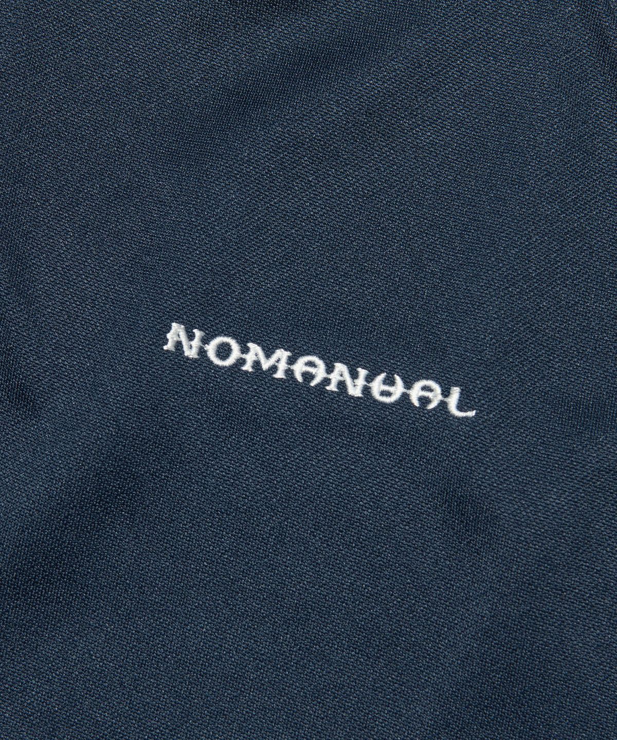노매뉴얼(NOMANUAL) EMBROIDERED TRIBAL TRACK TOP - NAVY