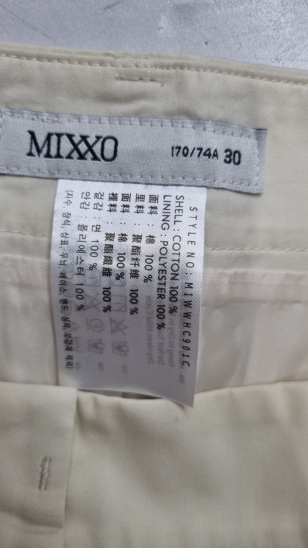 미쏘(MIXXO) 투턱 A라인 미니스커트 MIWWHC901C 30