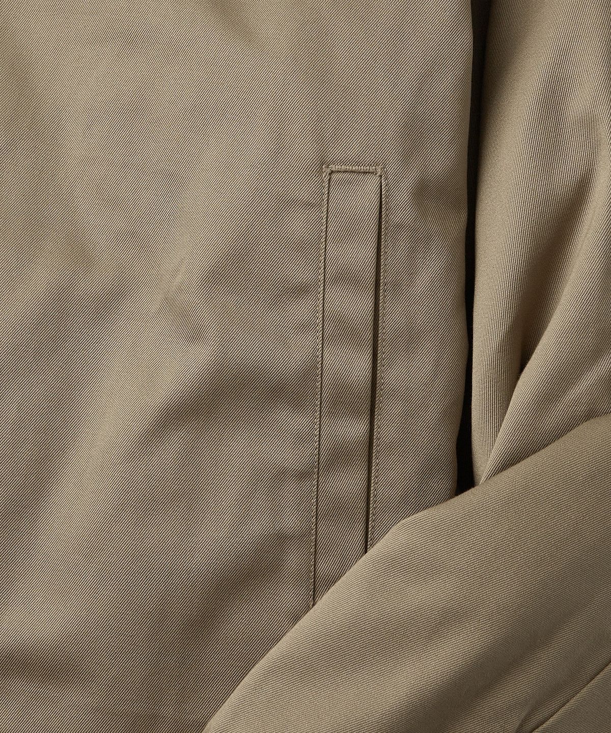 아웃스탠딩(OUTSTANDING) [LOONEY TUNES] REVERSIBLE QUILTED JACKET_KHAKI/OLIVE GREEN