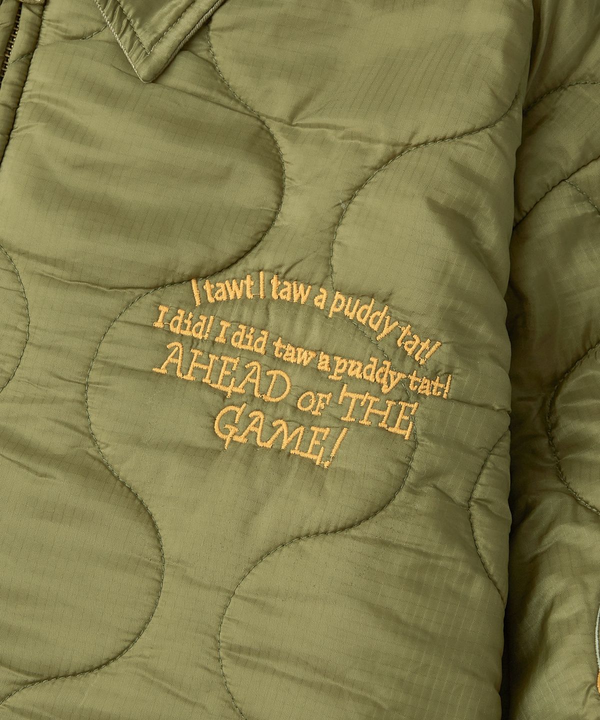 아웃스탠딩(OUTSTANDING) [LOONEY TUNES] REVERSIBLE QUILTED JACKET_KHAKI/OLIVE GREEN