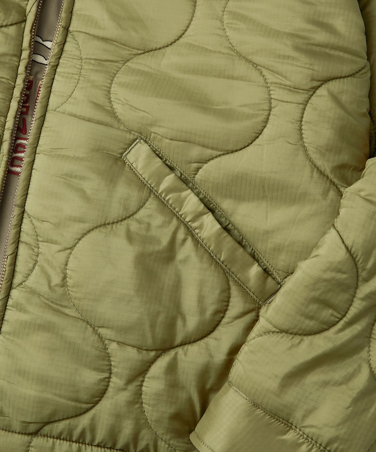 아웃스탠딩(OUTSTANDING) [LOONEY TUNES] REVERSIBLE QUILTED JACKET_KHAKI/OLIVE GREEN