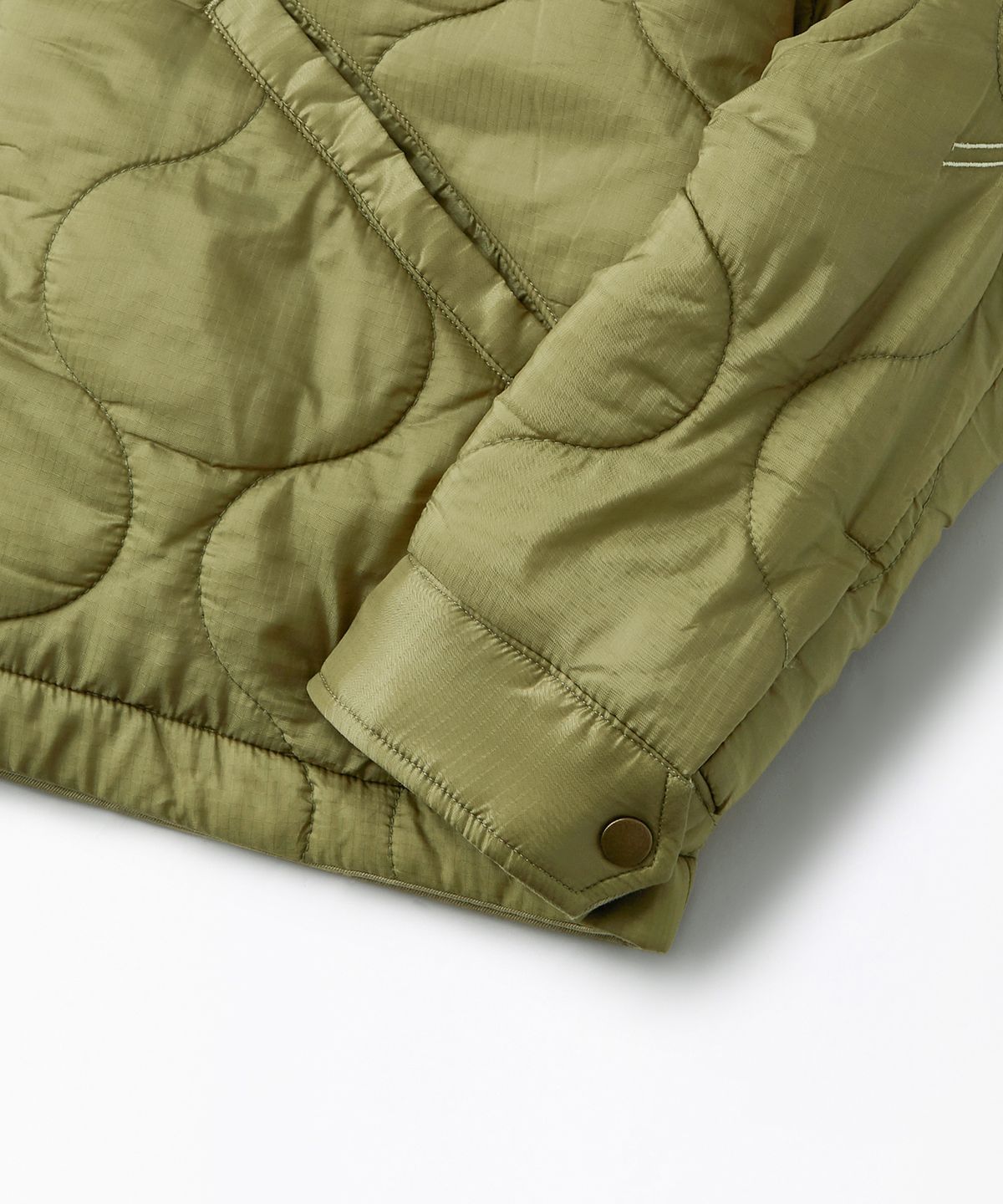 아웃스탠딩(OUTSTANDING) [LOONEY TUNES] REVERSIBLE QUILTED JACKET_KHAKI/OLIVE GREEN