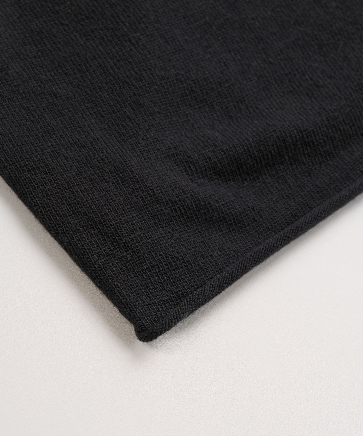 엑스컨테이너(EXCONTAINER) 롤링 크롭 니트 (BLACK)