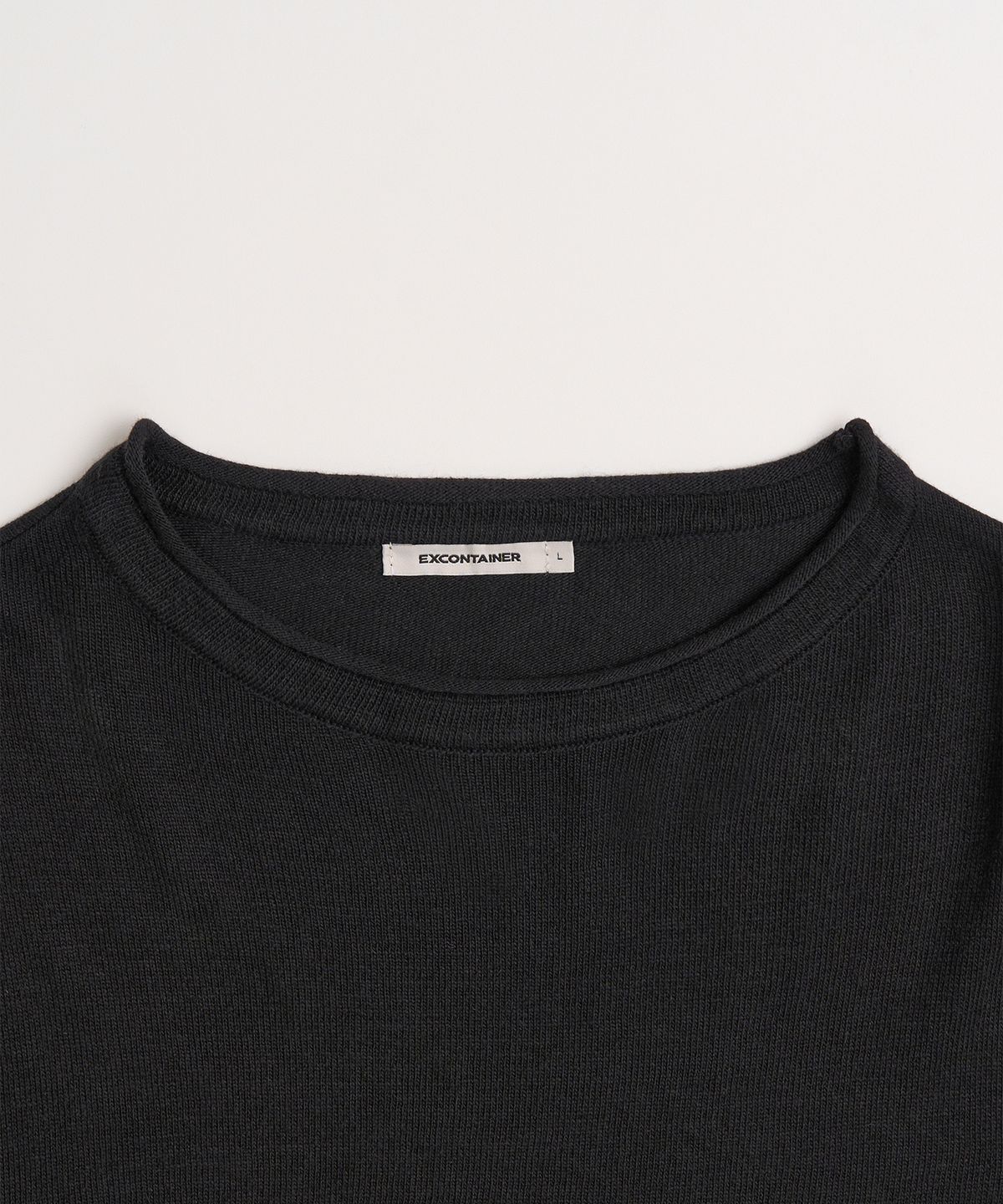 엑스컨테이너(EXCONTAINER) 롤링 크롭 니트 (BLACK)