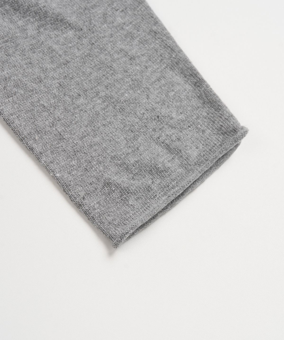엑스컨테이너(EXCONTAINER) 롤링 크롭 니트 (GREY)